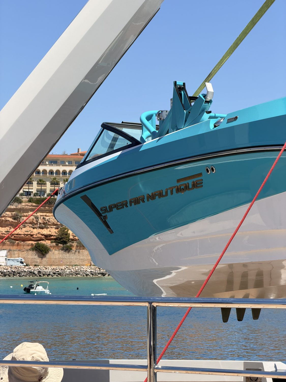 Wake tender being launched from a superyacht